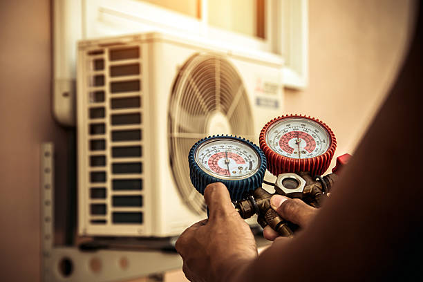 Professional Heat Pump Repair technician working in Warsaw, MO